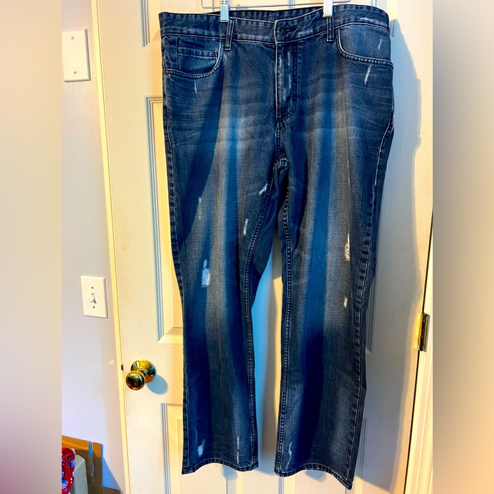 Calvin Klein dark wash distressed jeans size 38 unisex